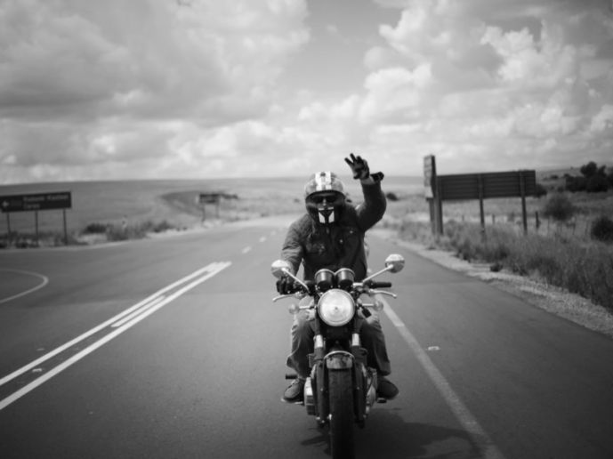 Bikers gathered outside a building